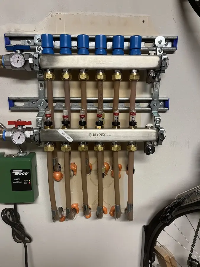 Plumber performing Water Heater Repair at a residential property in East Nottingham